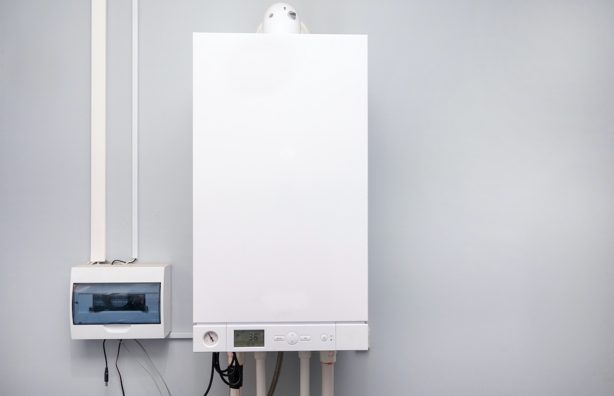 Gas boiler being serviced by a Zenith engineer